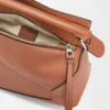 0d497519041562a281be588cefac970b-scaled-1.webp Small Puzzle Edge bag in classic calfskin