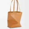17505bc984eb3767fe55fb7b85ea8cf0-scaled-1.webp Medium Puzzle Fold tote in shiny calfskin