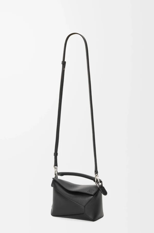 18aefa8d402041817d6b0e34562bbe6d-scaled-1.webp Mini Puzzle Edge bag in classic calfskin