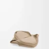 1b00b57c8f4480266b5ea3948c12c2dd-scaled-1.webp Mini Puzzle Fold tote in shiny calfskin