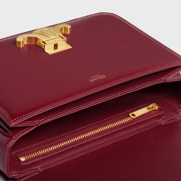 28eee298a2eb95785acbe2a07b8f0556.webp TEEN TRIOMPHE BAG IN SHINY CALFSKIN