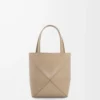 2a525e96f2e0a7acdb0efee16ea48976-scaled-1.webp Mini Puzzle Fold tote in shiny calfskin