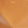 3770d4b03a3602f8971a3c6534a2364d-scaled-1.webp Medium Puzzle Fold tote in shiny calfskin