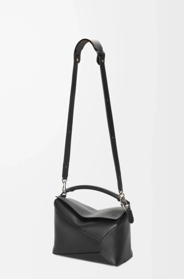 4b7b1163bc19df3cc0cbced445a111ab-scaled-1.webp Puzzle bag in classic calfskin