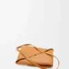 5d665e7cb39ac4155e77656810601391-scaled-1.webp Medium Puzzle Fold tote in shiny calfskin