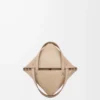6713daa2581a015258e73c5d3756c253-scaled-1.webp Mini Puzzle Fold tote in shiny calfskin