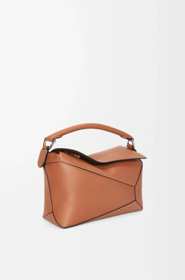 67c98e39c9dc684b7c8d87c2a5f68cba-scaled-1.webp Small Puzzle Edge bag in classic calfskin