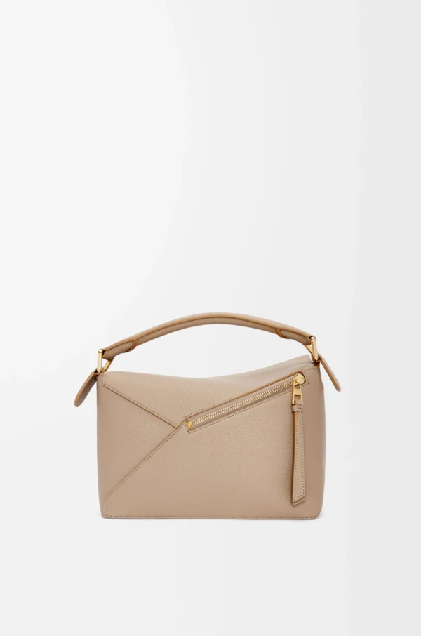6e07a11ddc15eda86ec7b37b1b1f8ea0-scaled-1.webp Small Puzzle bag in soft grained calfskin