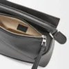 6f710f396c57926def57168af1985151-scaled-1.webp Mini Puzzle Edge bag in classic calfskin