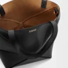 71d8290749b922738724a72b40554f0e-scaled-1.webp Mini Puzzle Fold tote in shiny calfskin