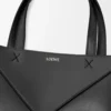 74c7d67f31edce3f8a843cb7734d500e-scaled-1.webp Mini Puzzle Fold tote in shiny calfskin