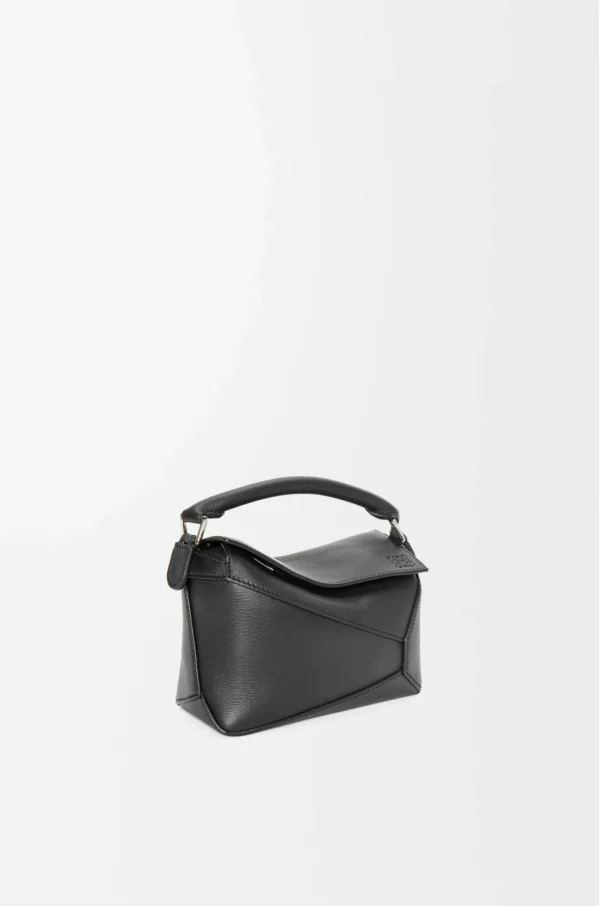 7ea4013c69d50fc2c100bcfcbf2f0f8c-scaled-1.webp Mini Puzzle Edge bag in classic calfskin