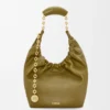 8032203f49b059170c373042262af010-scaled-1.webp Small Squeeze bag in mellow nappa lambskin