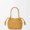 8780b7cf3821572c862240840b9a76d9-scaled-1.webp Mini Flamenco purse in mellow nappa lambskin