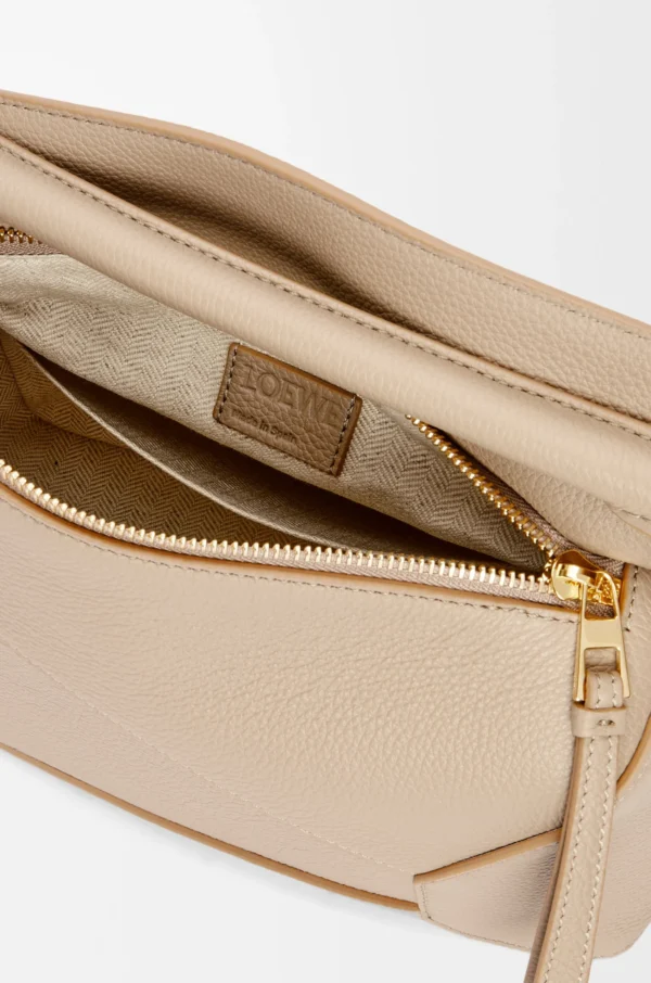 8f41dc4726b68f368780593cd74ff9e5-scaled-1.webp Small Puzzle bag in soft grained calfskin