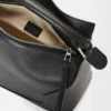 a1d9ce3386dd053b7f9c1853d8ea60f3-scaled-1.webp Puzzle bag in classic calfskin