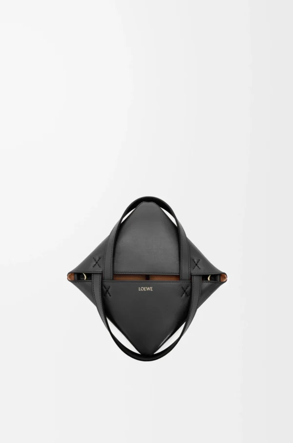 a9feb89f96528034451fdaa03d786629-scaled-1.webp Mini Puzzle Fold tote in shiny calfskin