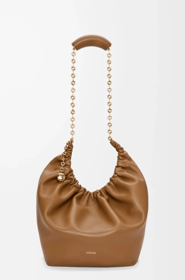ddedff8cc408865da716ff8877cec9de-scaled-1.webp Medium Squeeze bag in mellow nappa lambskin