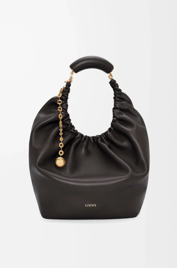 ec613e7b742bad69e1ec410796eacc8e-scaled-1.webp Medium Squeeze bag in mellow nappa lambskin