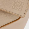 f33e7bf654c5ba1472e3cb999429efb5-scaled-1.webp Small Puzzle bag in soft grained calfskin
