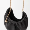 f3f0969a1aabbda9616f276d29dcf6b8-scaled-1.webp Medium Squeeze bag in mellow nappa lambskin