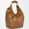 f506cd69999b3a5990af3910cf8aa194-scaled-1.webp Medium Squeeze bag in mellow nappa lambskin