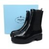 Prada Monolith patent leather booties black